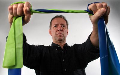 Howard Schneider demonstrates a series of exercises with a resistance band. If the intensity seems inadequate, double the band over, or use two at once.The Washington Post (The Washington Post / The Spokesman-Review)
