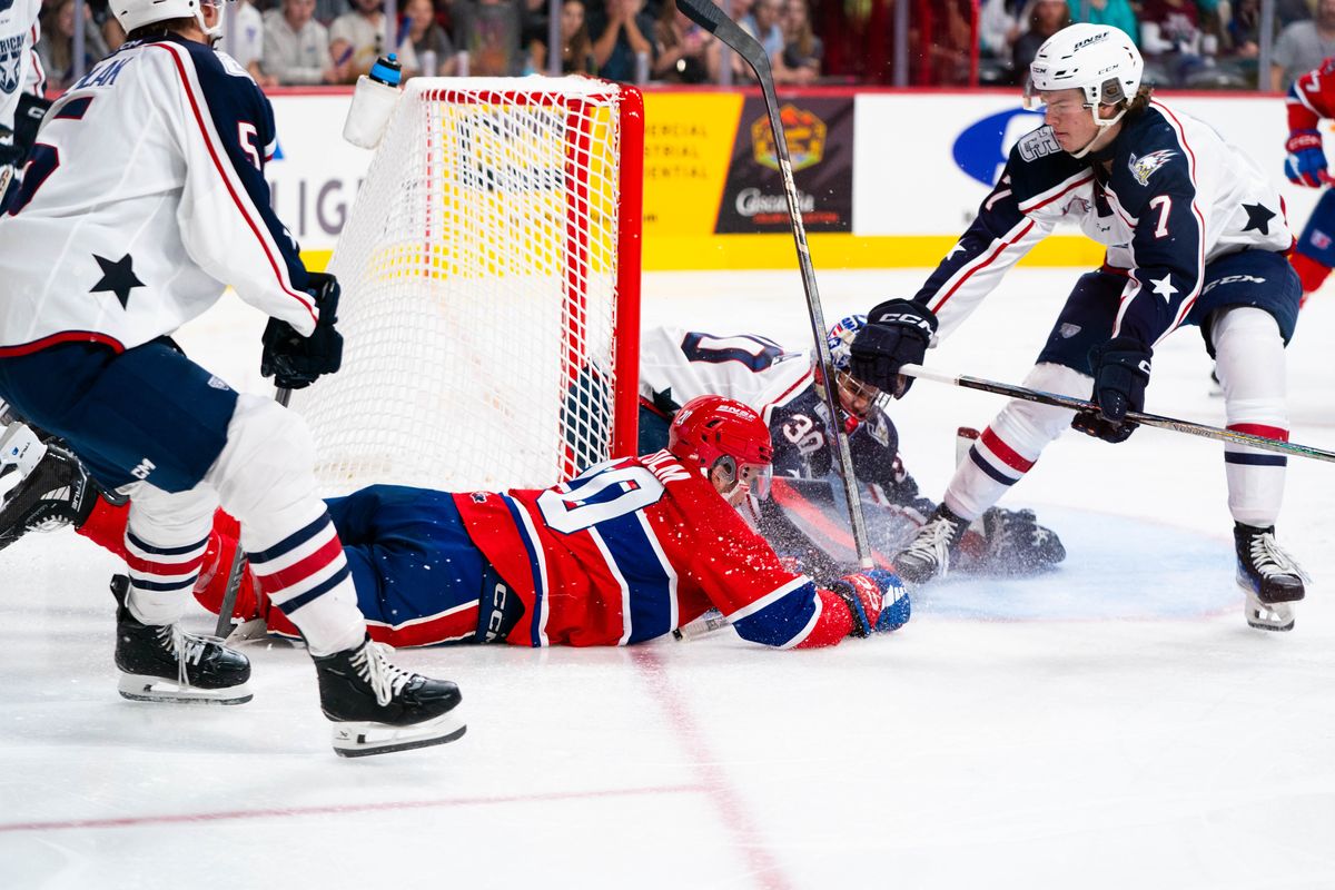 Spokane Chiefs forward Shea Van Olm falls to his chest after scoring his first goal of the game in the second period against the Tri-City Americans on Sept. 28, 2024. The Chiefs won 4-1.   (Larry Brunt)