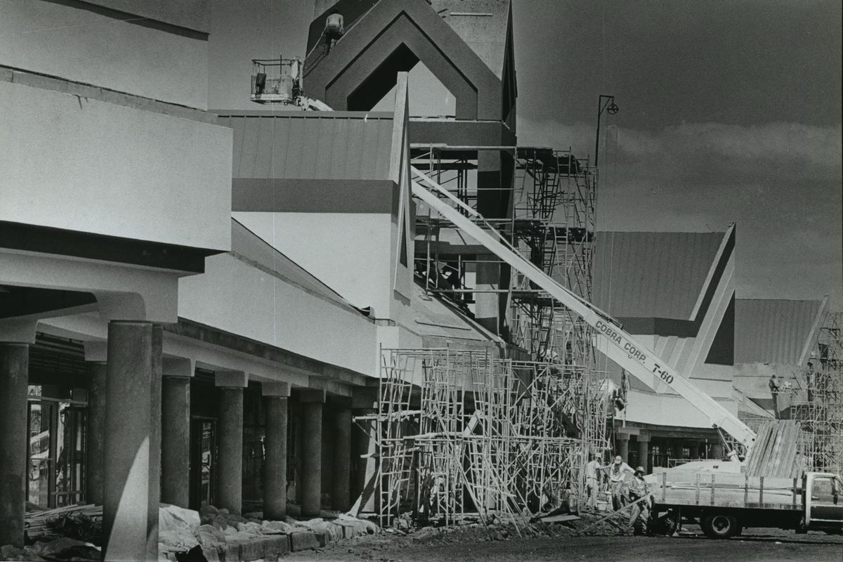 Crews complete work on a phase of the Post Falls Factory Outlets in this 1991 photograph. (Chris Anderson / Cowles Publishing)