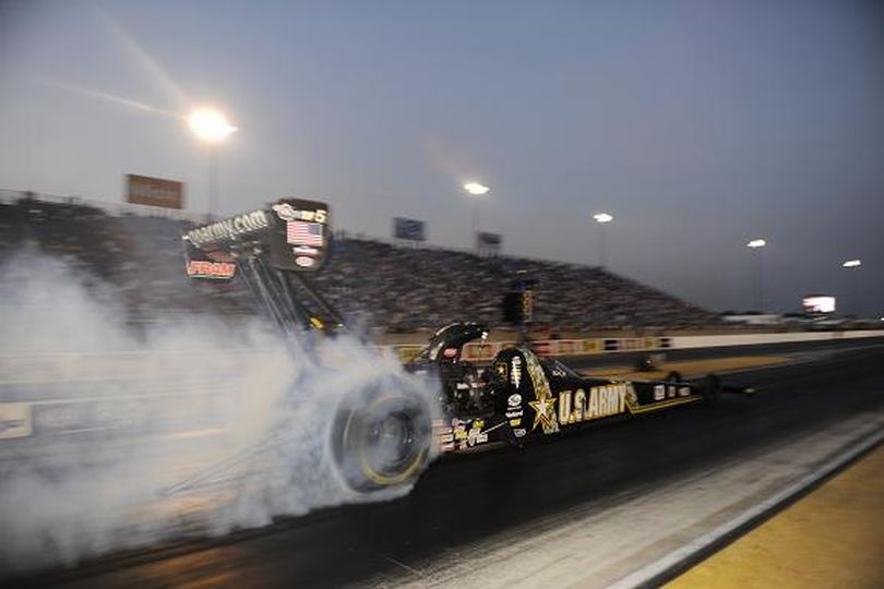Tony Schumacher powered his famed U.S. Army dragster to a performance of 3.763 seconds at 324.83 mph to claim his second top qualifying position of the season and 69th of his career. (Photo courtesy of NHRA)
