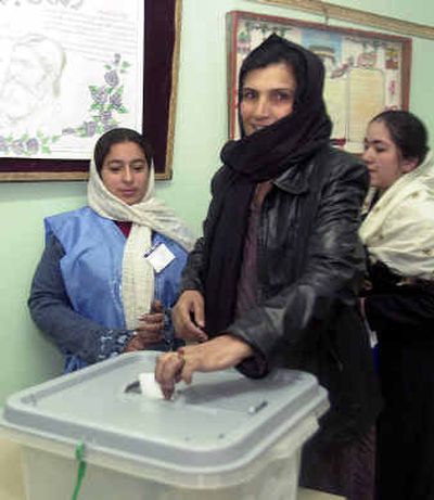 
A woman casts her ballot today in Kabul, Afghanistan.
 (Associated Press / The Spokesman-Review)
