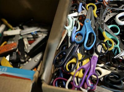 
Boxes of sorted scissors and knives travelers have had to give up at airport security checkpoints are stored at the Pennsylvania General Services Department's warehouse in Harrisburg. 
 (Associated Press / The Spokesman-Review)