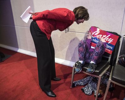 Congresswoman Cathy McMorris Rodgers chats with a shy Ginger Allbee,6, before McMorris Rodgers took to the stage to thank the gathering at the Davenport Hotel for her support, Nov. 8, 2016. (Dan Pelle / The Spokesman-Review)