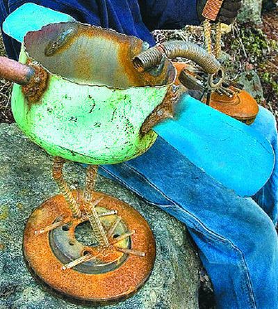 
Junk by a Punk makes garden art out of scrap metal. Pots and pans, metal bars and old brake rotors are welded together to make a chicken.  
 (The Spokesman-Review)