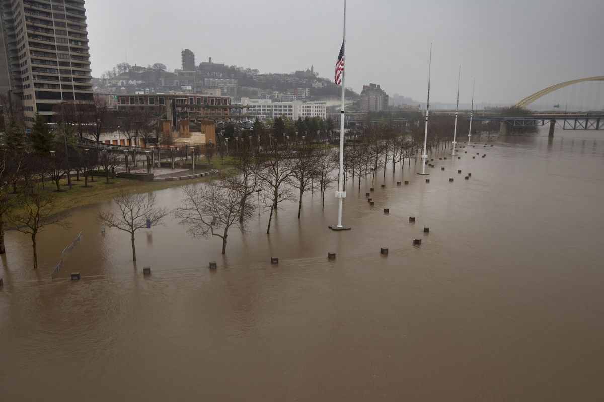 A view from the Central Bridge shows the flooding from the Ohio River  Saturday, Feb. 24, 2018 in Cincinnati.  Forecasters expected the Ohio River could reach levels not seen since the region