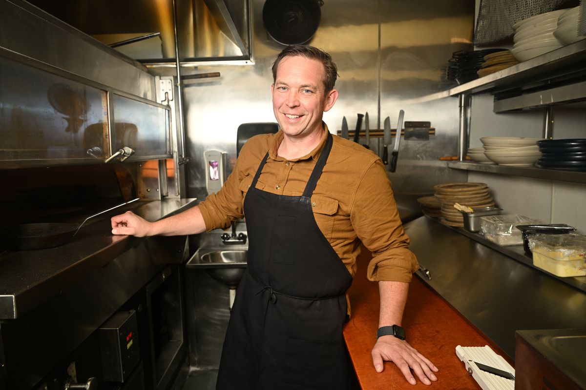 Adam Hegsted, longtime chef and owner of the Eat Good Group of restaurants, is shown Feb. 20 in the kitchen at Baba, Hegsted’s Middle Eastern-themed restaurant in Kendall Yards. He’s back to his busy schedule after open heart surgery in 2023.  (Jesse Tinsley/THE SPOKESMAN-REVIEW)