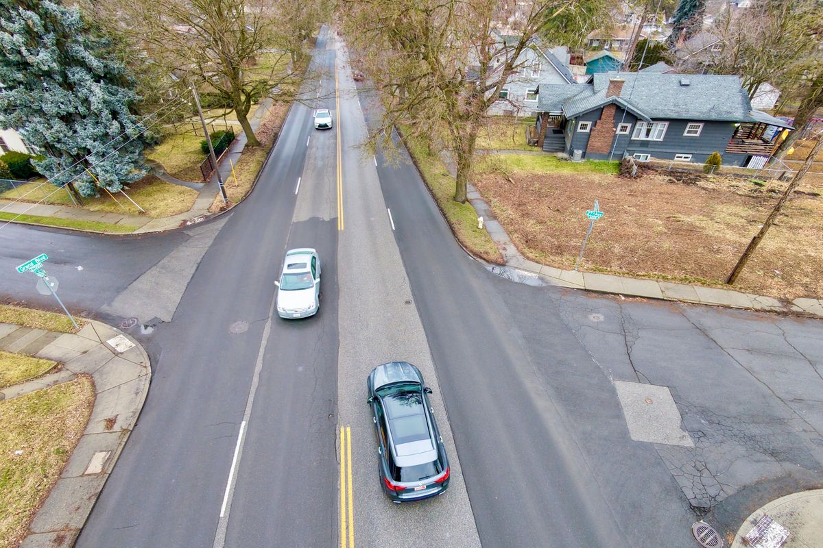 Looking north on Grand Boulevard at 27th Avenue on Spokane’s South Hill shows the busy arterial at a place where the city of Spokane would like to install an improved crosswalk and possible narrow the roadway to three lanes instead of four between 14th Avenue and 29th Avenue.  (Jesse Tinsley/THE SPOKESMAN-REVIEW)