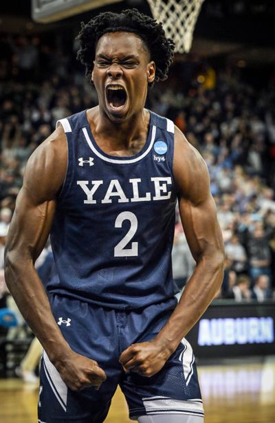 Yale guard Bez Mbeng celebrates the Bulldogs’ NCAA Tournament win over Auburn at the Arena.  (COLIN MULVANY)