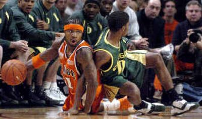 
Illinois' Dee Brown, left, had 13 points in the Illini's rout of the Oregon Ducks. 
 (Associated Press / The Spokesman-Review)