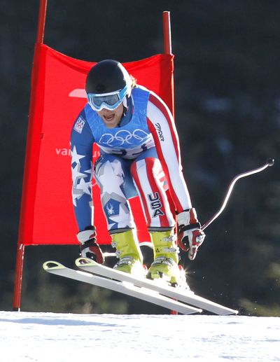 Will Brandenburg of the United States takes a jump as he speeds down the course during the downhill portion of the Men's super-combined, at the Vancouver 2010 Olympics in Whistler, British Columbia, Canada, Sunday, Feb. 21, 2010. (Luca Bruno / Associated Press)