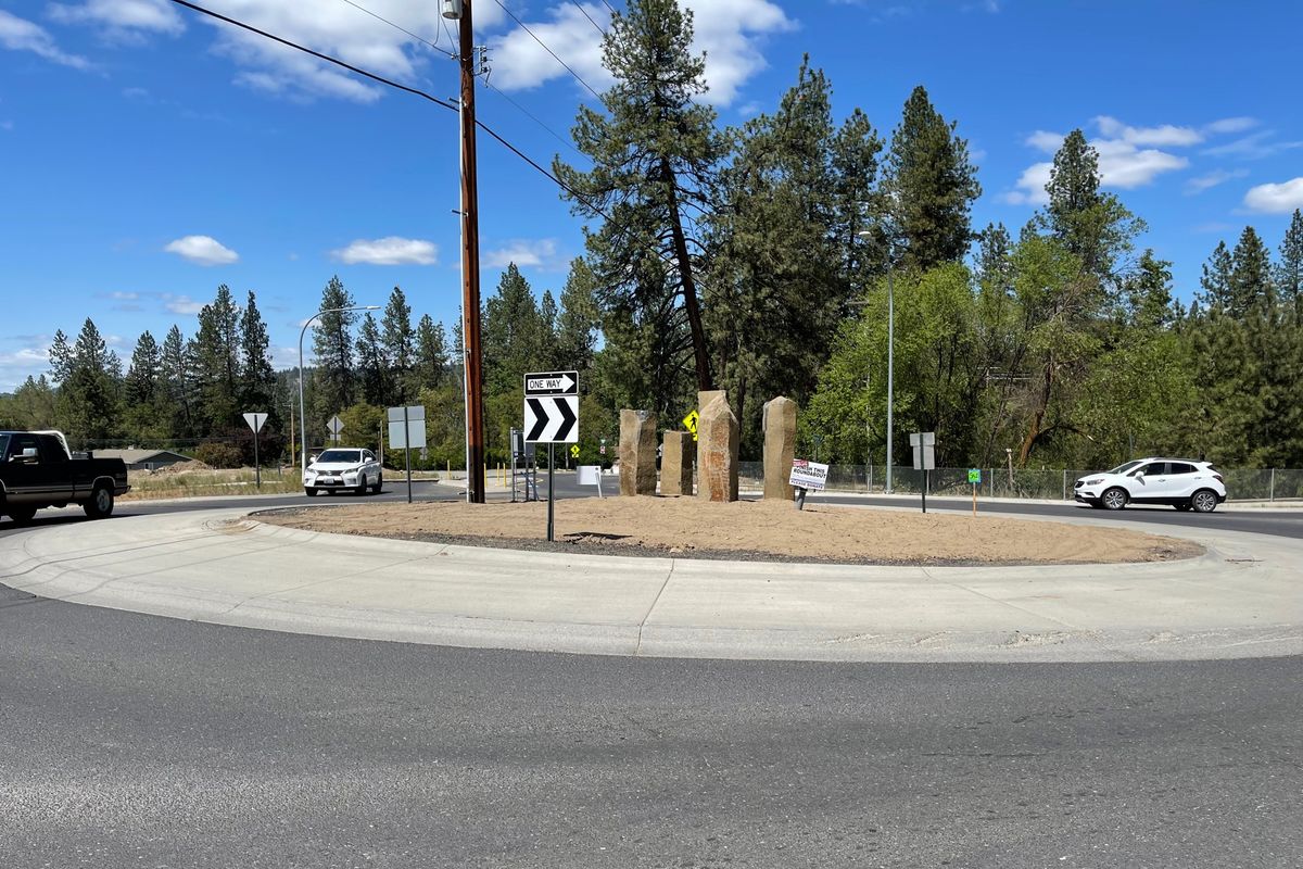 A roundabout with basalt pillars directs traffic in the Fairwood neighborhood. Area residents have been working to improve the traffic control feature as well as add visual interest.  (Courtesy)