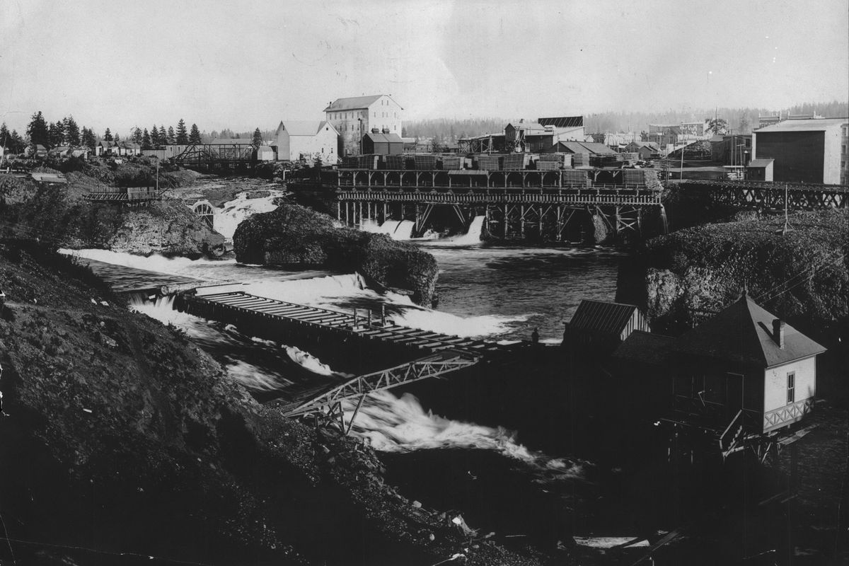 1888 - The building in the foreground is the first power plant in Spokane, a 30 kilovolt Edison Electric generator that was set in the north channel of the Spokane River by the Edison Electric Illuminating Company of Spokane Falls. SPOKESMAN-REVIEW PHOTO ARCHIVE (SPOKESMAN-REVIEW PHOTO ARCHIVE / SR)