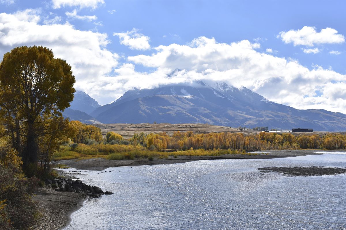 FILE - In this Oct. 8, 2018, file photo, Emigrant Peak is seen rising above the Paradise Valley and the Yellowstone River near Emigrant, Mont. The Biden administration has nominated a longtime environmental advocate and Democratic aide, Tracy Stone-Manning, to oversee roughly 250 million acres of public lands as director of the Bureau of Land Management. (Matthew Brown)