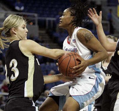 
Idaho's Jordyn Bowen, left, strips the ball from Aarica Ray-Boyd.
 (Associated Press / The Spokesman-Review)