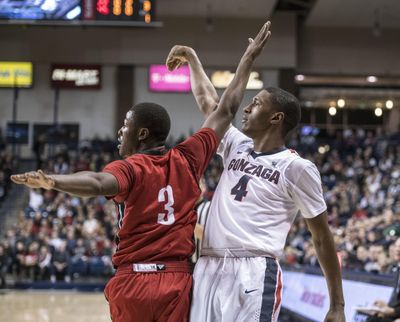 Gonzaga guard Jordan Mathews, hitting a shot over South Dakota guard Triston Simpson on Dec. 21, says he’s not concerned about travel lag for the 7th-ranked Zags. (Dan Pelle / The Spokesman-Review)