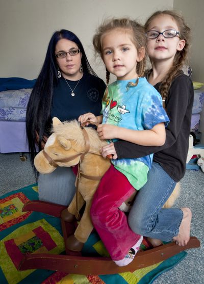  Crystal Watkins,  a single working mother of two girls, Andrea, 4, and Autumn, 6, is in danger of losing her child care subsidy. (Colin Mulvany)