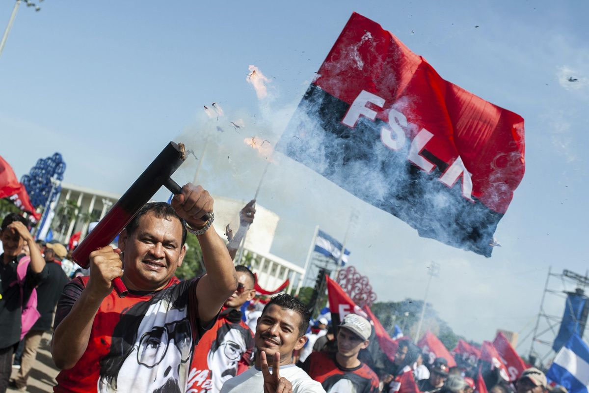 A Sandinista follower fires a home made mortar during the celebration of the 39th anniversary of the Sandinista revolution, in Managua, Nicaragua, Thursday, July 19, 2018. Nicaragua marked anniversary of the 1979 revolution against dictator Anastasio Somoza, despite an ongoing political crisis that has seen hundreds killed in a government crackdown on protesters seeking President Daniel Ortega’s exit from office. (Cristobal Venegas / Associated Press)