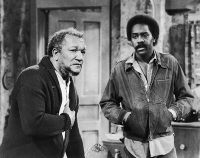 American actors Red Foxx (1922 - 1991) (left) Demond Wilson in a still from the television series, 'Sanford And Son,' in 1974.   (NBC Television/Getty Images )