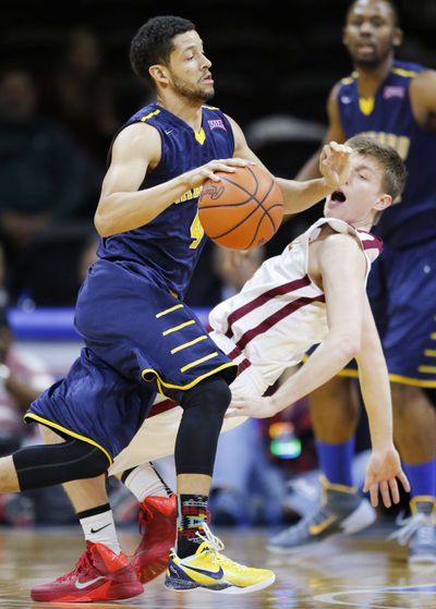 Preston Wynne, left, had 20 points for Vanguard. (Associated Press)