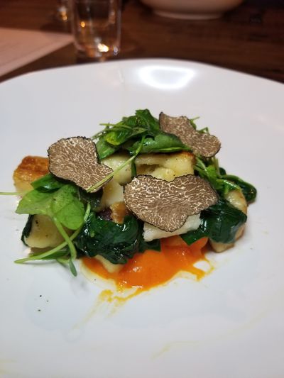 Inland Pacific Kitchen’s carrot puree with gnocchi, spinach, brown butter and truffles served Nov. 16.  (Kris Kilduff/For The Spokesman-Review)