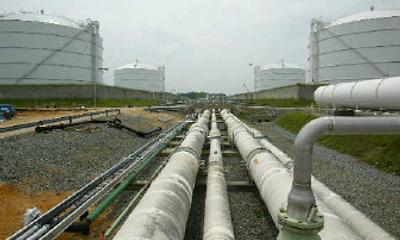 
 Pipelines run from the offshore docking station to the four LNG tanks at the Dominion Liquified Natural Gas facility in Cove Point, Md. 
 (Associated Press / The Spokesman-Review)