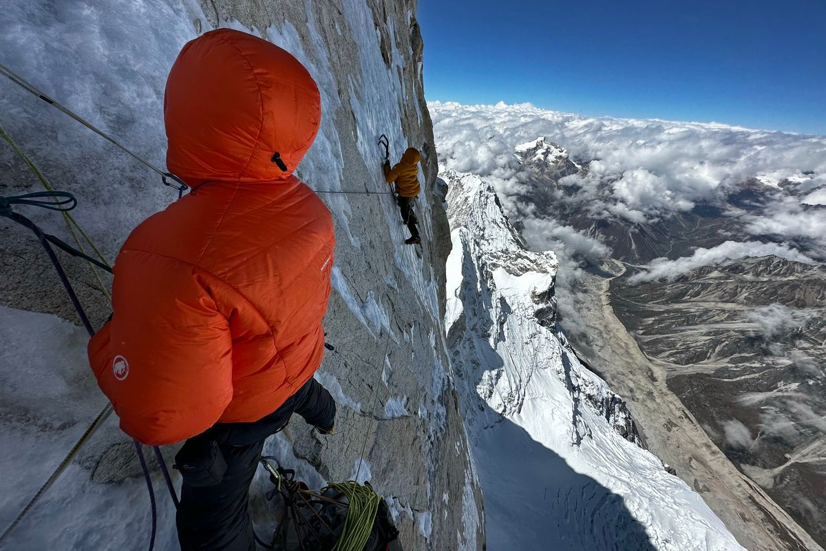 A photo by Jackson Marvell of fellow climbers Alan Rousseau, left, and Matt Cornell on Mount Jannu in October. No previous climbers had done an Alpine-style ascent — no supplemental oxygen, no ropes fixed in advance, no porters beyond base camp — of the north face of the Himalayas’ Mount Jannu. (Jackson Marvell via The New York Times) -- NO SALES, FOR EDITORIAL USE ONLY WITH MOUNT JANNU CLIMB BY JOHN BRANCH FOR DEC. 1, 2023. ALL OTHER USE PROHIBITED.  (JACKSON MARVELL)
