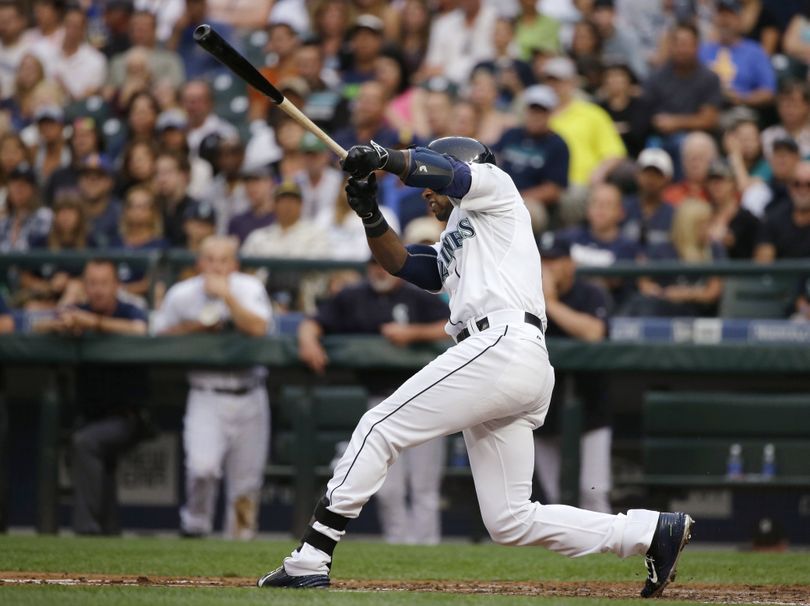 Mariners’s Austin Jackson connects on first grand slam of his career in third inning. (Associated Press)