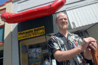 
Peter Grubb of ROW Adventures stands outside his new storefront at 413 Sherman Ave., where his business, which provides whitewater, fishing, and kayaking adventures, will gain more visibility. 
 (Jesse Tinsley / The Spokesman-Review)