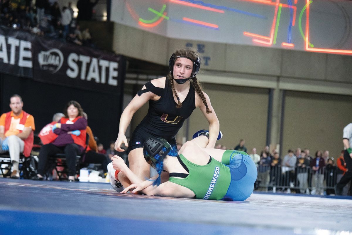 University's Libby Roberts cracks a smile after winning the State 3A girls 110-pound title at Mat Classic 36 last Friday at the Tacoma Dome. Madison McCord/The Spokesman-Review  (MADISON MCCORD/FOR THE SPOKESMAN-REVIEW)