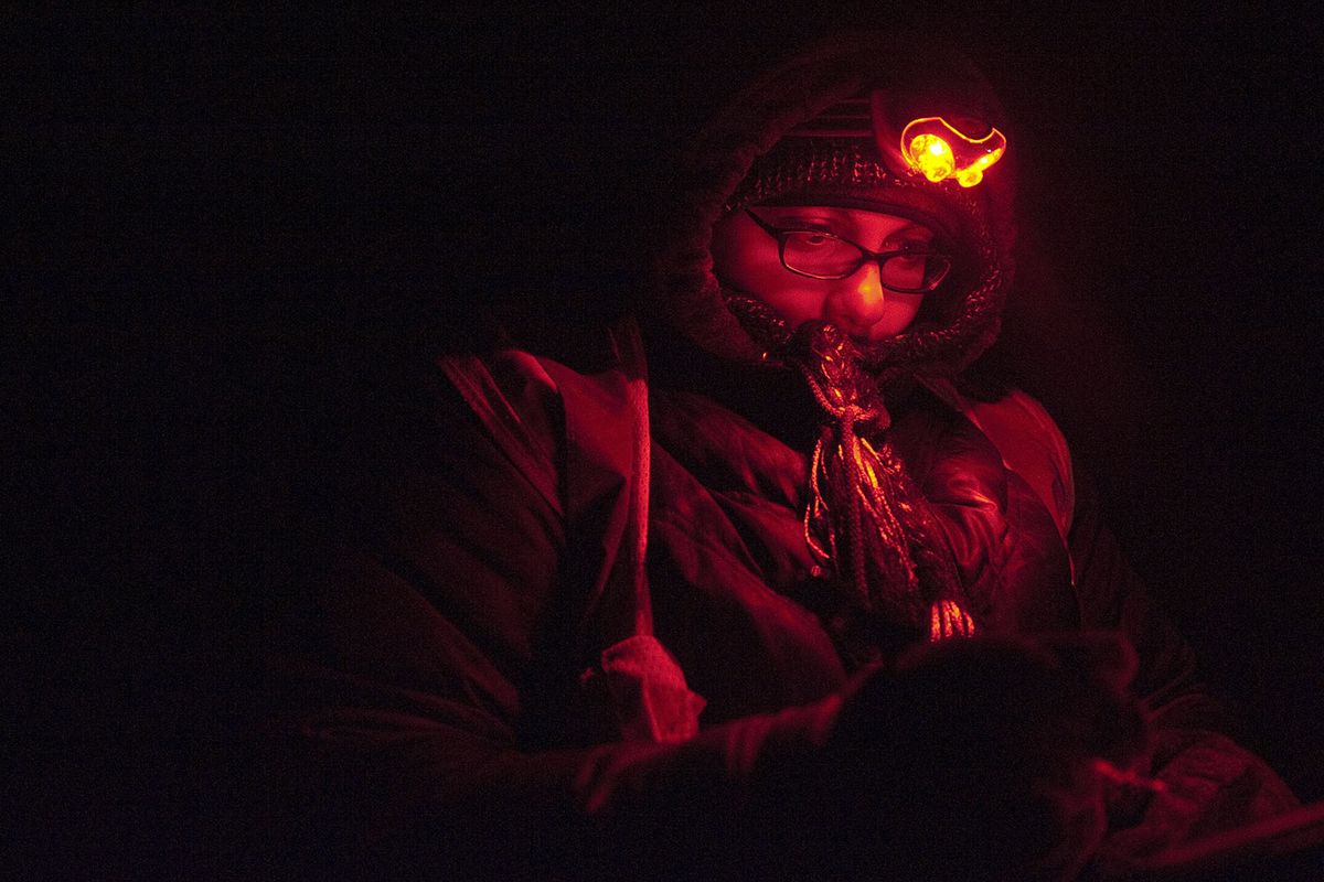 Sara Pourzamani takes notes during a research outing Jan. 24 on Highway 25 east of Eden, Idaho. (Associated Press)