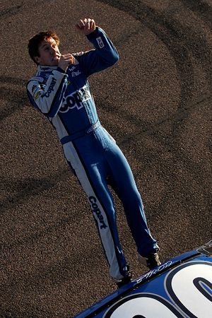Carl Edwards does his trademark backflip to celebrate his WYPALL 200 win at Phoenix International Raceway. (Photo Credit: Todd Warshaw/Getty Images for NASCAR) (Todd Warshaw / Getty Images North America)