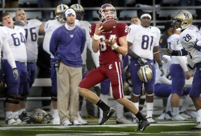 Jared Karstetter hauls in a 48-yard pass from  Kevin Lopina in the final seconds of regulation to set up the tying field goal and send the game into overtime.  (CHRISTOPHER ANDERSON / The Spokesman-Review)