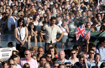 
Members of a crowd gather in London's Trafalgar Square on Thursday during a vigil to pay homage to the victims of last week's bomb attacks on the capital which claimed at least 54 lives.
 (Associated Press / The Spokesman-Review)