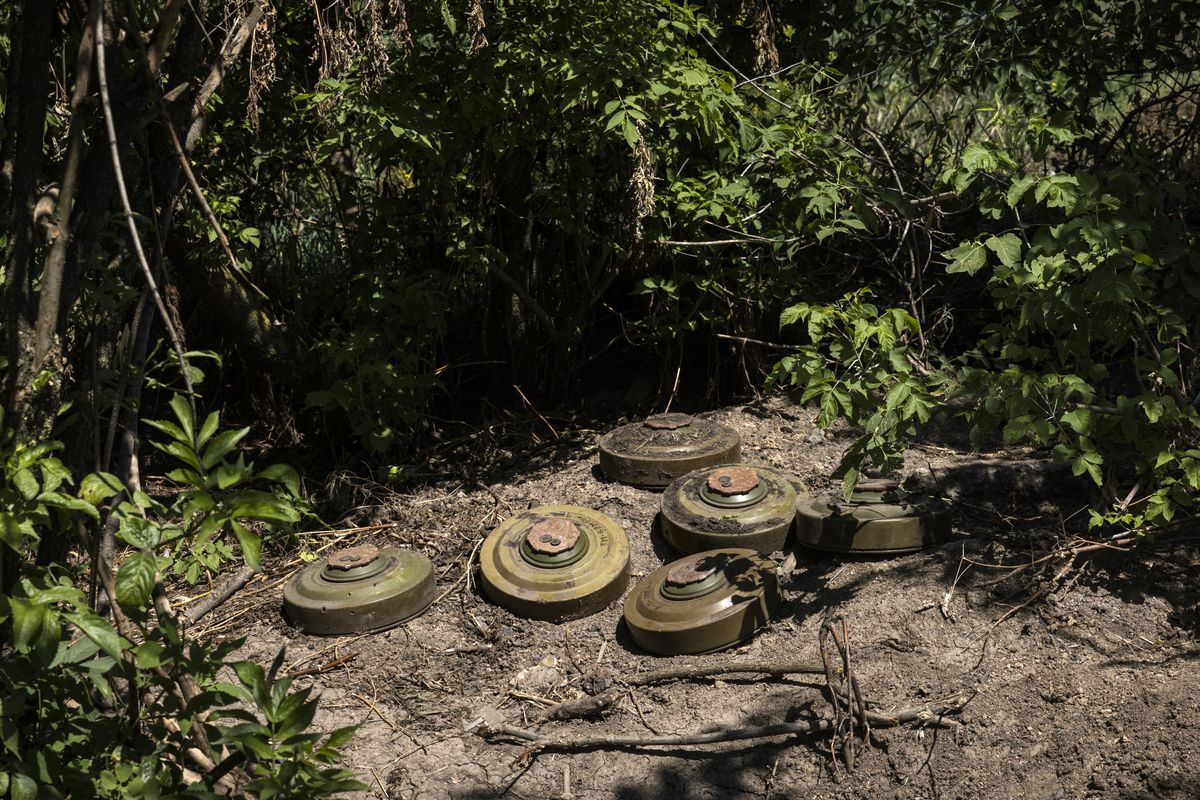 **EMBARGO: No electronic distribution, Web posting or street sales before 3:01 a.m. ET Sunday, July 16, 2023. No exceptions for any reasons. EMBARGO set by source.** FILE -- Six mines in Novodarivka, Ukraine, July 6, 2023. To gain ground, Ukrainian forces have to make their way through a variety and density of Russian land mines they never imagined. (David Guttenfelder/The New York Times)  (DAVID GUTTENFELDER)