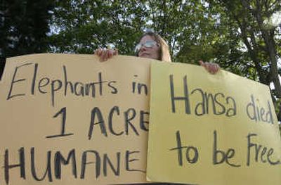 
Animal-rights activist Gayle Janzen protests the living conditions of elephants at Woodland Park Zoo on Friday  in Seattle. Associated Press
 (Associated Press / The Spokesman-Review)