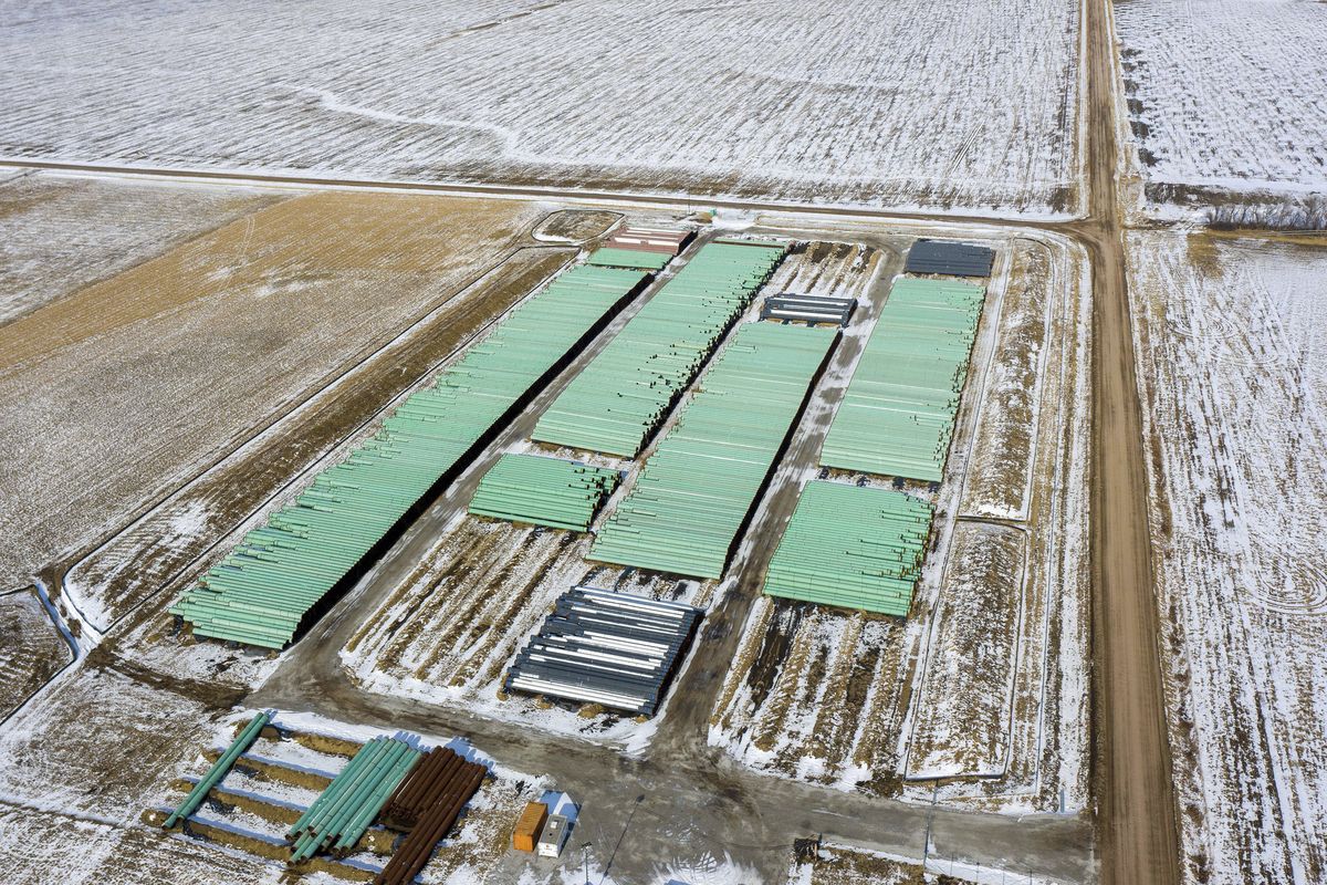 In this Dec. 18, 2020 photo, pipes to be used for the Keystone XL pipeline are stored in a field near Dorchester, Neb. Canadian Prime Minister Justin Trudeau says his officials have been in frequent contact with President-elect Joe Biden’s incoming administration making the case for a long disputed oil pipeline that reports say Biden will cancel on his first day in office. (Associated Press)
