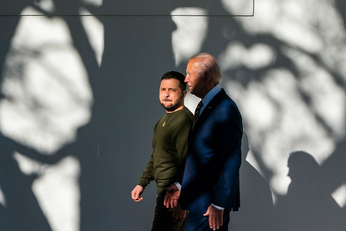 President Biden escorts Volodymyr Zelensky to the Oval Office during the Ukrainian president’s high-stakes visit to Washington on Dec. 21.  (Demetrius Freeman/The Washington Post)