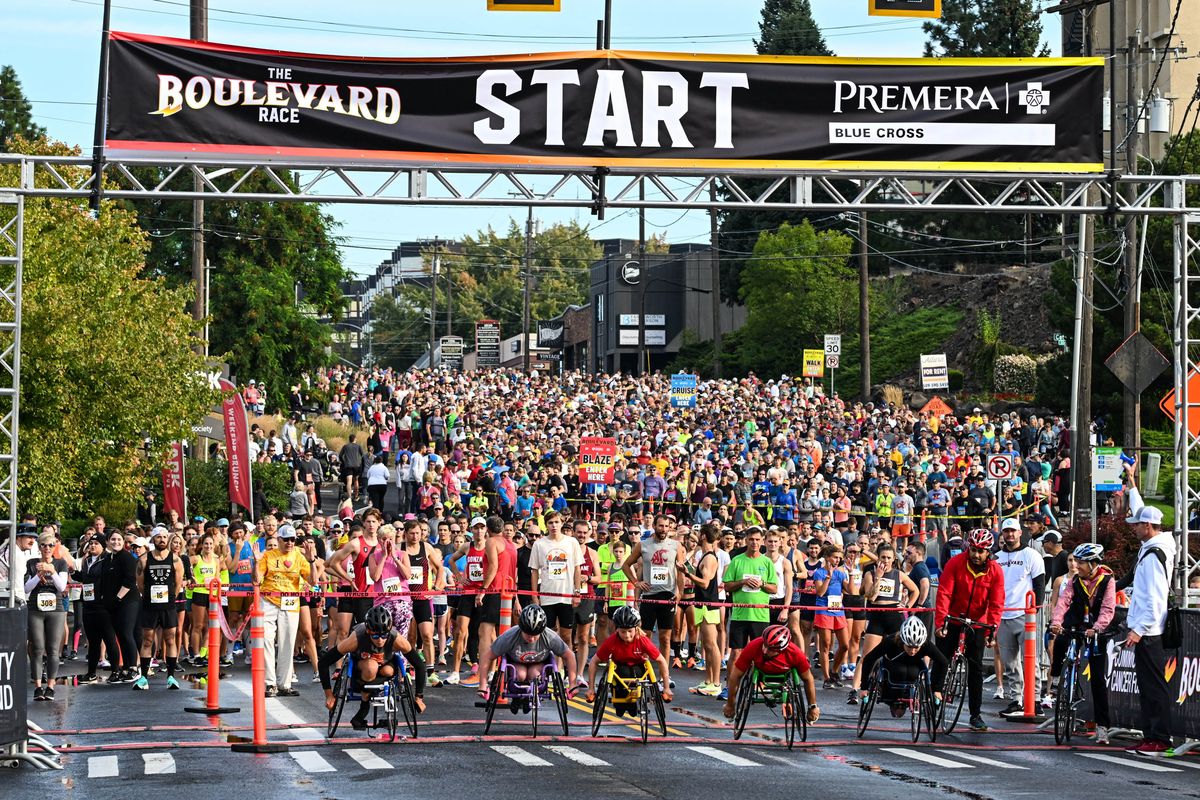 Wheelchair competitors break from the start of the Boulevard Race, Sunday, Sept. 24, 2023, in Spokane.  (DAN PELLE/THE SPOKESMAN-REVIEW)