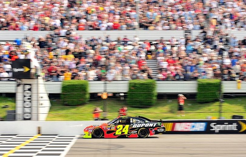 Jeff Gordon crosses the finish line to win the 5-Hour Energy 500 at Pocono Raceway, his second victory of 2011. (Photo Credit: Jason Smith/Getty Images for NASCAR) (Jason Smith / Getty Images North America)
