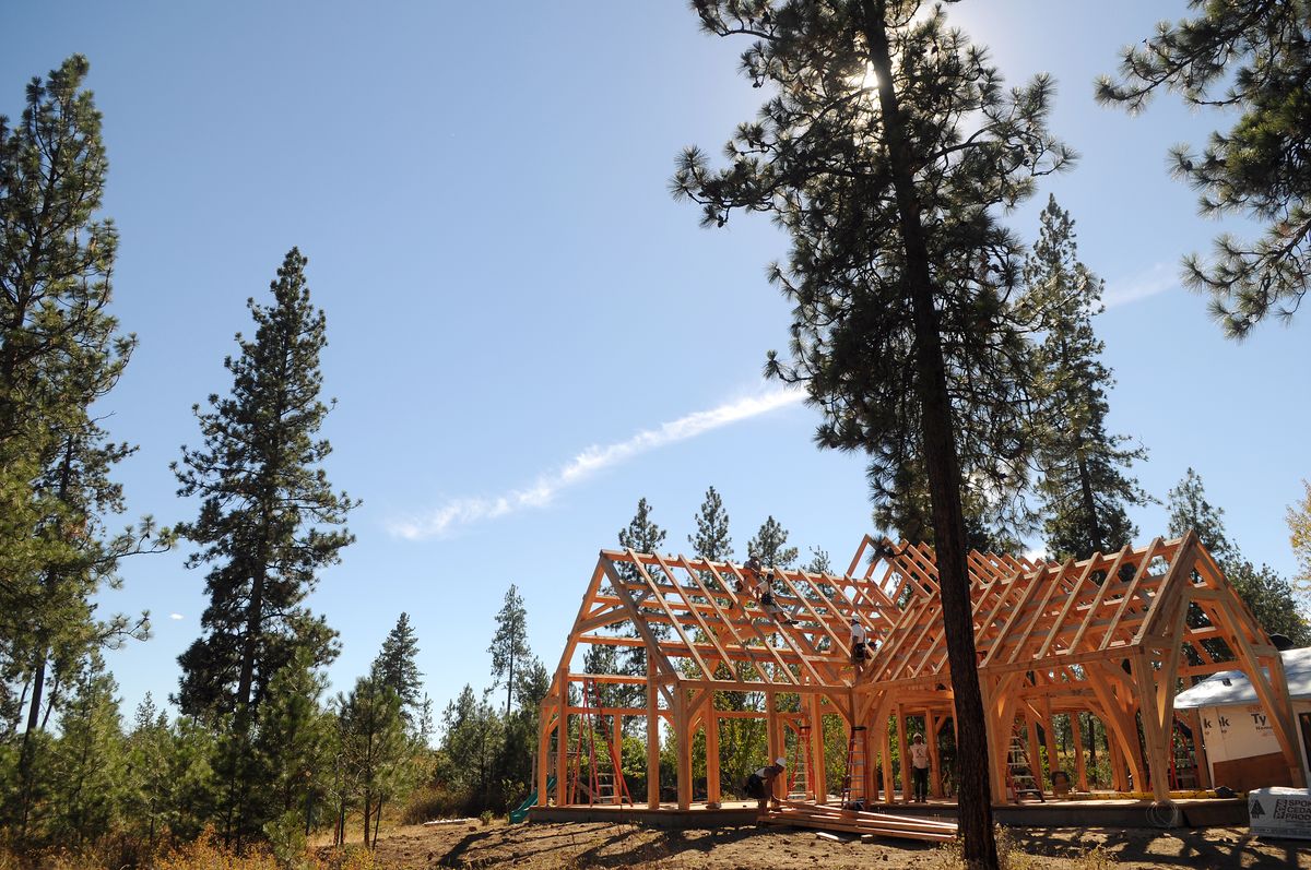 A timber frame is constructed back from Sherman Road in rural Spokane County,  where Kim Northrop and Derek Hanson are building their home.  (Rajah Bose / The Spokesman-Review)