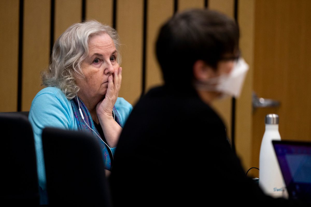 Romance writer Nancy Crampton Brophy, left, accused of killing her husband, Dan Brophy, in June 2018, watches proceedings in court in Portland, Ore., on Monday.  (Dave Killen)