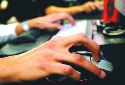 
Psychiatrists and gamers say young males are most at risk for video game addiction.
 (Associated Press / The Spokesman-Review)