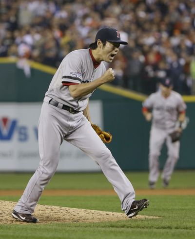 Red Sox closer Koji Uehara got the last four outs to earn the save on Tuesday. (Associated Press)