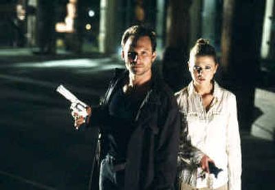 
Christian Slater stars as Edward Carnby and Tara Reid plays Aline Cedrac in 