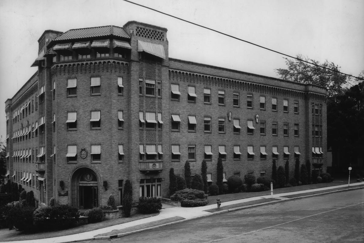 1960: The Culmstock Arms Apartments, built in 1928, is one of the lower South Hill’s premier apartment buildings, home to many who worked at Sacred Heart hospital, Deaconess or other businesses. The rooms had views of the downtown area from many apartments. Contractor Walter M. Clist built and owned the block, around the same time he was also serving as contractor on the Fox Theater, which was completed in 1930. Clist had also been a construction supervisor on the Davenport Hotel in 1914 while working for Braxton Engineering and had a hand in many projects in Washington and Oregon.  (Spokesman-Review photo archives)