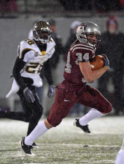 Montana running back Chase Reynolds had 193 yards rushing in semifinal victory.  (Associated Press)
