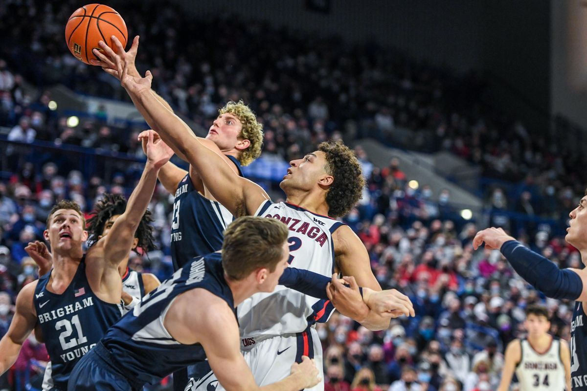Gonzaga forward Anton Watson battles BYU’s Caleb Lohner for a rebound during Thursday’s West Coast Conference game.  (Dan Pelle/THE SPOKESMAN-REVIEW)