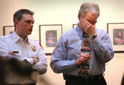 
Spokane Fire Chief Bobby Williams wipes his face with his hand after meeting the media on Wednesday to discuss the resignation of a firefighter who quit because of sexual misconduct. At his side is Assistant Chief Brian Schaeffer. 
 (Photos by Brian Plonka / The Spokesman-Review)
