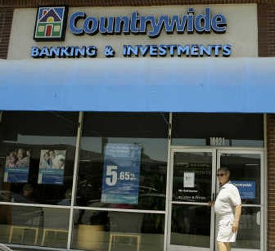 
A Countrywide bank customer enters a Los Angeles branch on Monday. Associated Press
 (Associated Press / The Spokesman-Review)