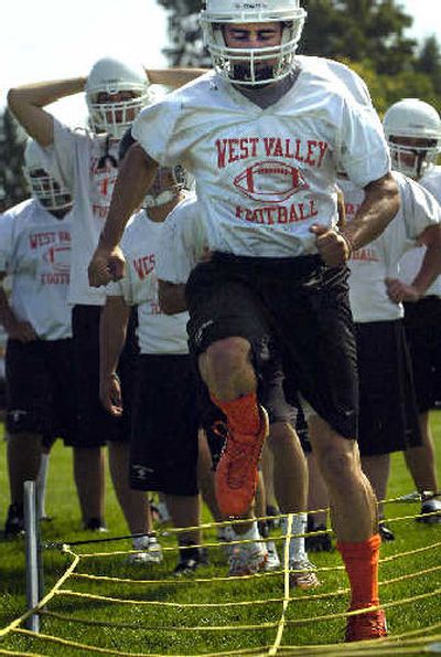 
WV senior Camron Bowman leads his team through agility drills. 
 (Holly Pickett / The Spokesman-Review)